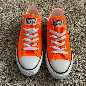 Converse. Chuck Taylor. Neon Orange. Unisex. Women’s size 8. Men’s size 6